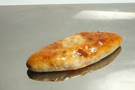 Осетинский пирог с сыром и зеленью