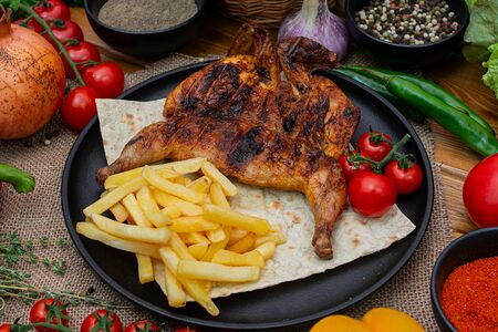 Цыпленок табака на мангале