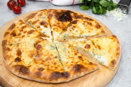 Пирог осетинский с сыром и кинзой