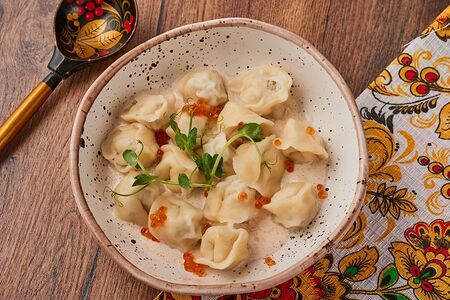 Пельмени из щуки в сливочном соусе