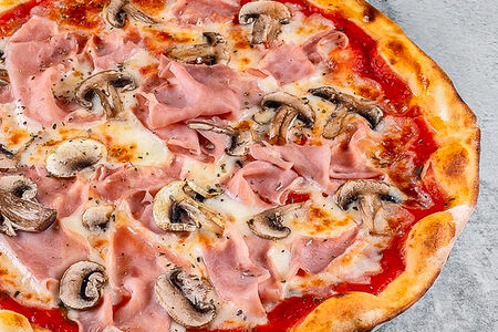 Пицца с ветчиной и грибами