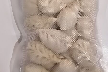 Пельмени с капустой и мясом замороженные