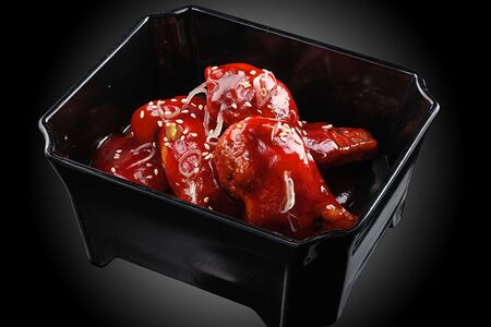 Куриные крылышки в кисло-сладком соусе