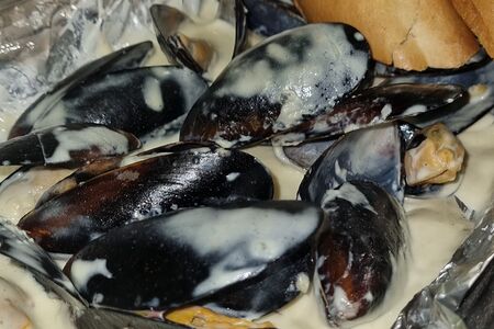 Мидии в сливочном соусе