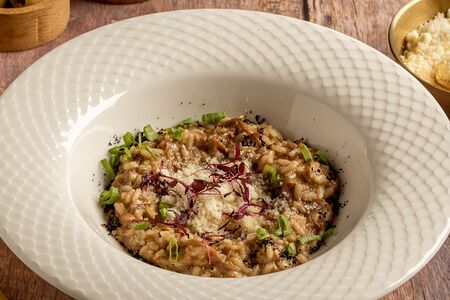 Ризотто с рваной уткой и белыми грибами 