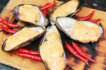 Мидии спайси