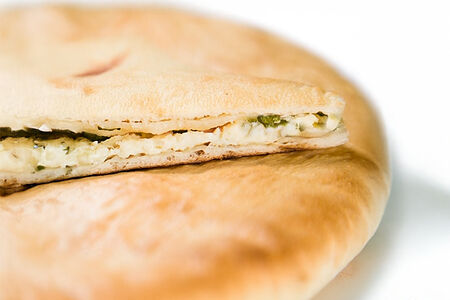 Осетинский пирог с сыром и зеленым луком