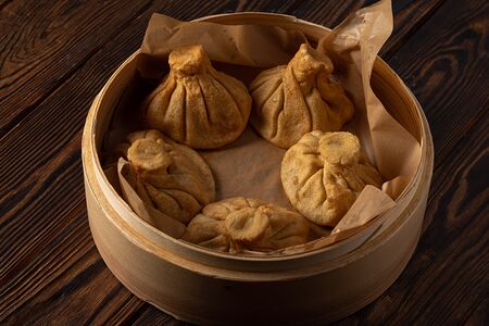 Жареные хинкали с бараниной и зеленью 