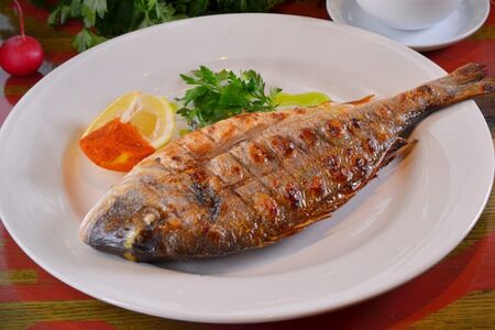 Дорадо с гранатовым соусом