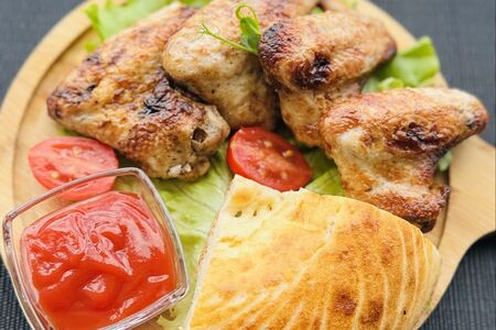 Куриные крылышки на углях