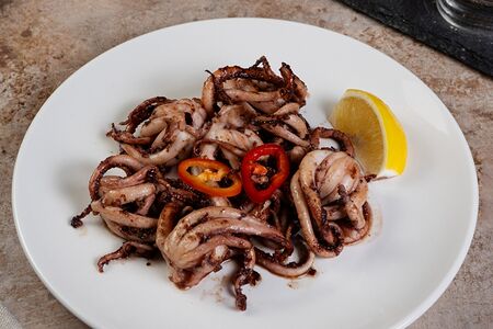 Щупальца кальмара жареные