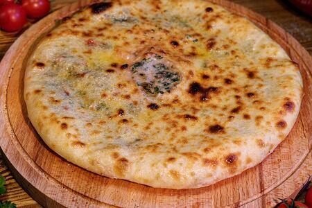 Осетинский пирог с сыром и листьями свеклы 