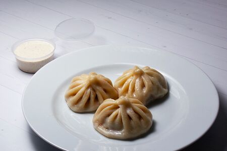 Хинкали с соусом тузлук