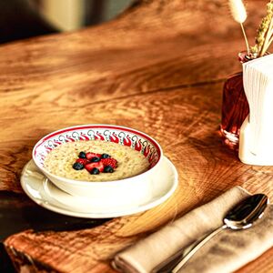 Овсяная каша на молоке с топленым сливочным маслом