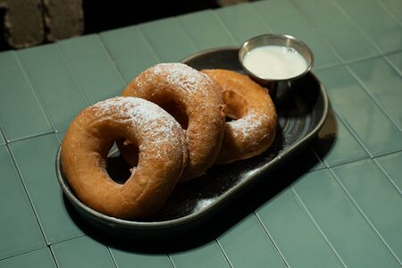 Пышки с молочным соусом