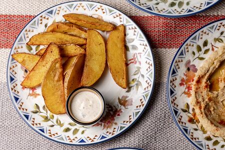 Дольки картофеля с мацони