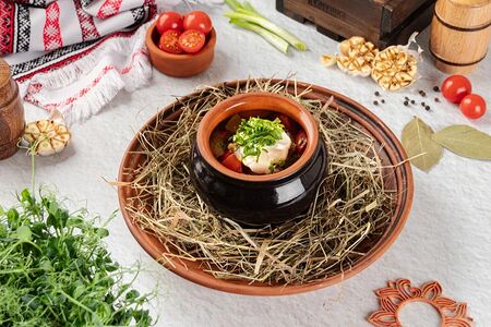 Телятина, томленная с овощами