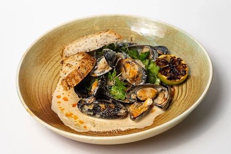 Мидии в сливочном соусе