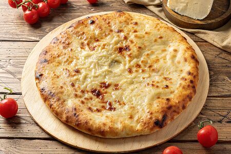 Осетинский пирог с сыром и помидорами