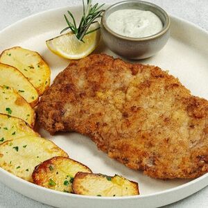 Свиная отбивная с запечённым картофелем