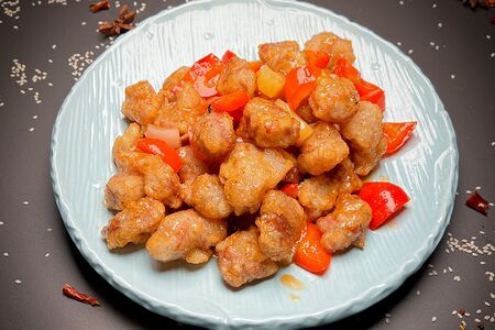 Свинина в кисло-сладком соусе с ананасом