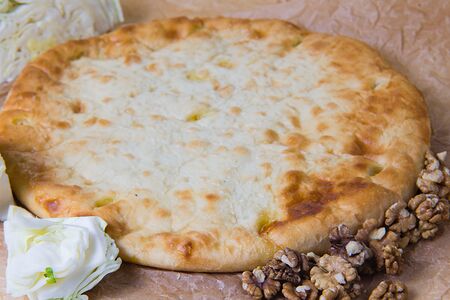 Осетинский пирог с капустой и грецкими орехами
