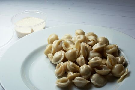 Дюшбара с соусом тузлук