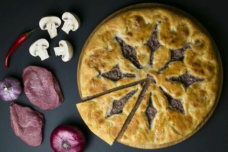 Осетинский пирог с мясом и грибами
