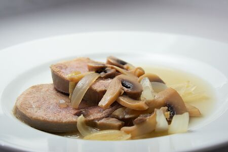 Язык говяжий в грибном соусе