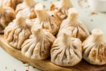 Жареные хинкали с шампиньонами  