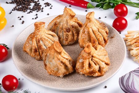 Жареные хинкали с бараниной