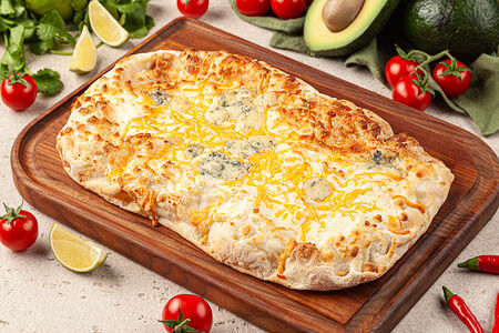 Пицца четыре сыра