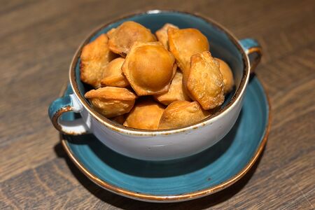 Пельмени жареные 