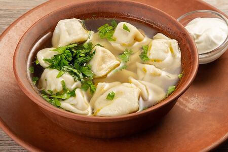 Суп с традиционными пельменями