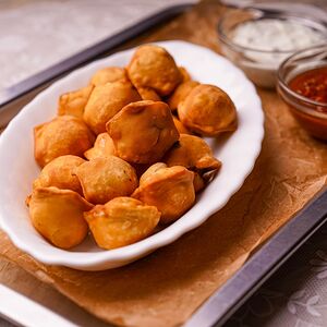 Пельмени жареные