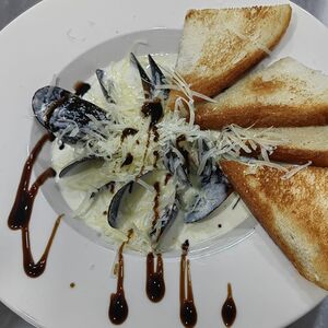 Мидии в сливочном соусе