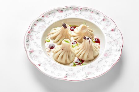 Мини-хинкали с сыром в сливочно-брусничном соусе