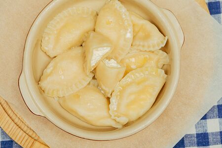 Большая порция вареников с творогом