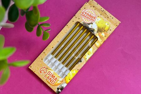 Свечи золотые длинные