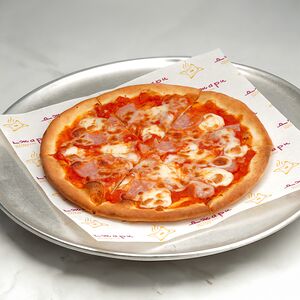 Пицца с ветчиной и сыром 