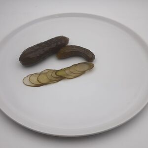 Огурец маринованный 