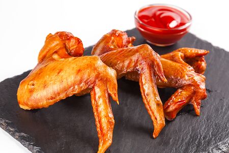 Куриные крылья варено-копченые