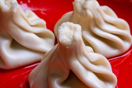 Хинкали с говядиной и свининой отварные (порция)