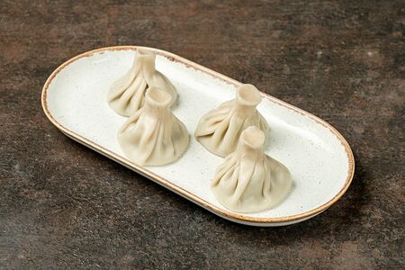 Хинкали с сыром сулугуни и свежей мятой