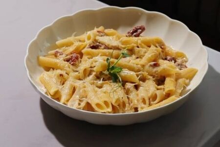 Сливочная паста с аришоками и томатами