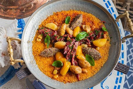 Тажин с кускусом и томленой лопаткой баранины