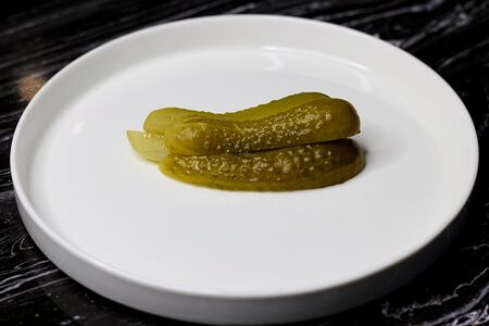 Огурцы солёные