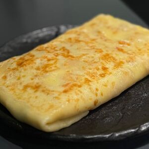 Блин с яйцом