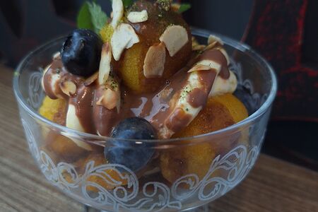 Жареный банан в сырно-апельсиновом соусе