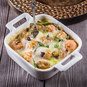 Запечённые пельмени в сливках